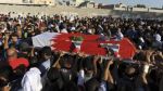 Thousands of Bahrainis mourn for woman killed in crackdown