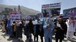 go home, Afghans say on anniversary of fall of Kabul