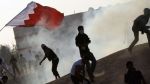 Bahraini regime forces attack protesters, raid homes