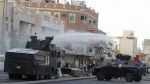 Bahraini forces clash with mourners after funeral